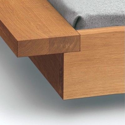 Detalle acabado esquina Cama Noah en nogal aceitado de E15. Disponible en Moisés showroom