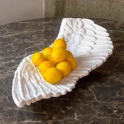 Seletti sculpture Memorabilia Mvsevm Wing left Seletti sculpture Memorabilia Mvsevm Wing left