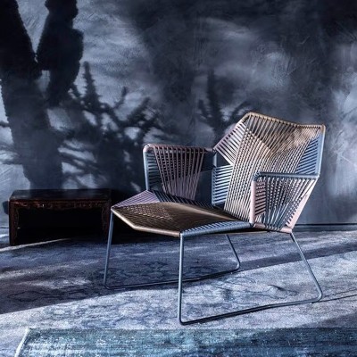 Moroso, Tropicalia armchair with stainless steel arms and base. Moroso, Tropicalia armchair with stainless steel arms and base.